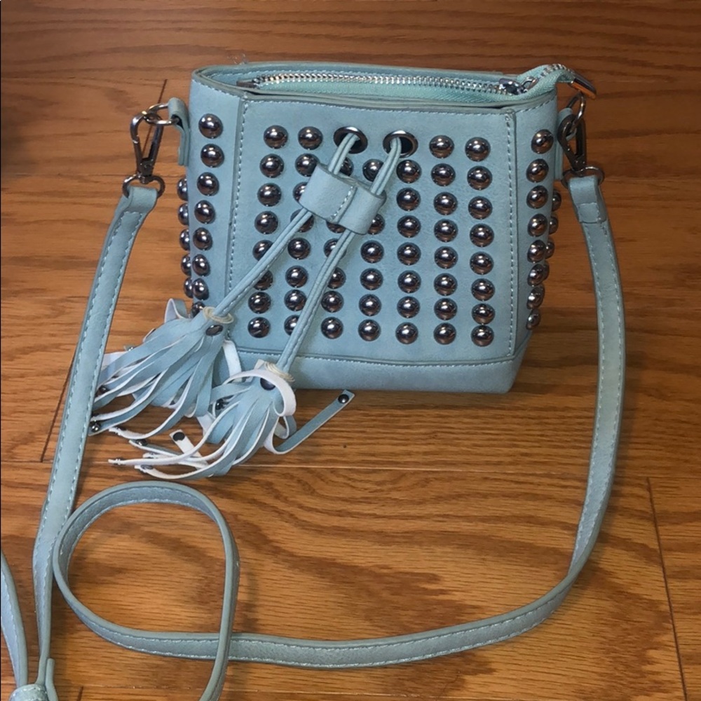 Woman shoulder bag with silver studs